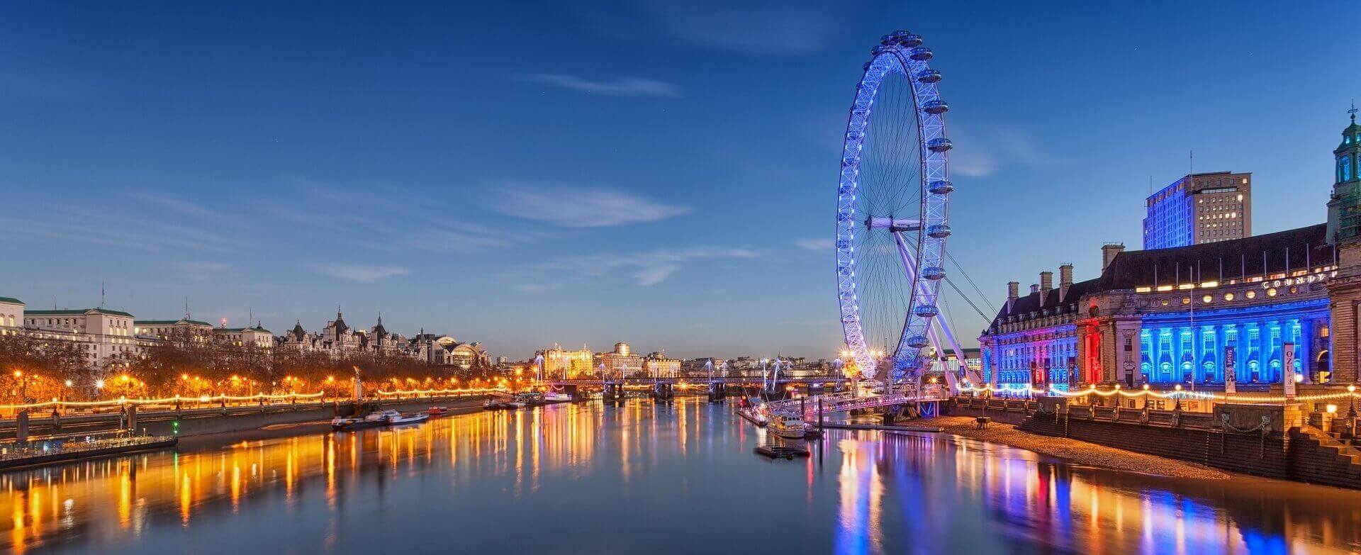 The London Eye Ferris wheel on the south bank of the Thames River